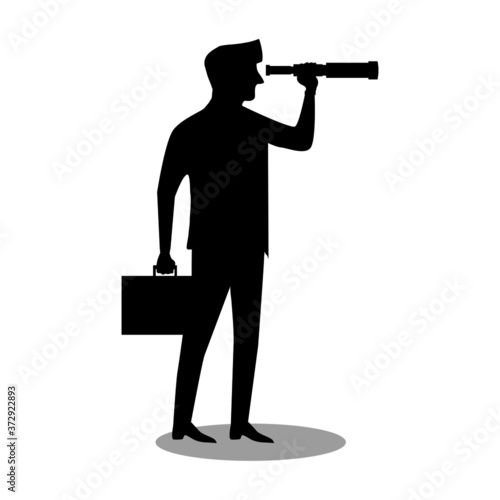 Silhouette A business man standing in the hand Use a telescope to look into the distance. Business vision