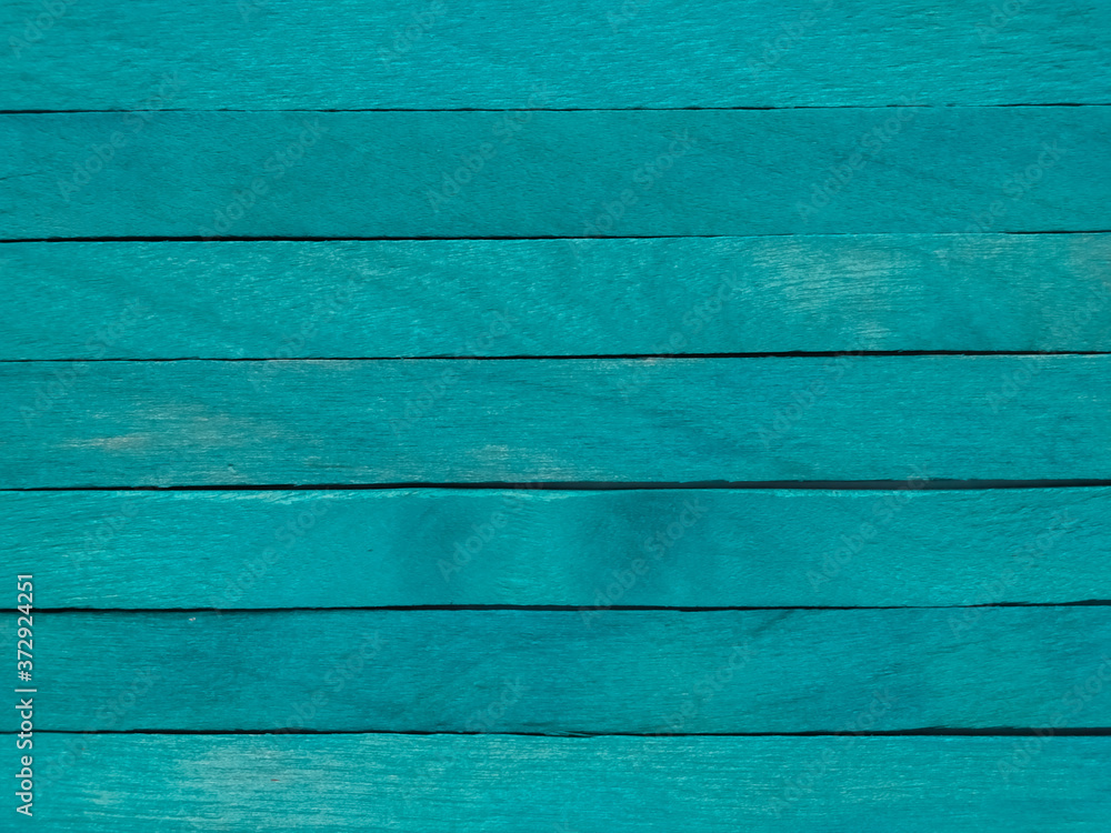 Obraz premium Background of blue popsicle sticks with horizontal view.