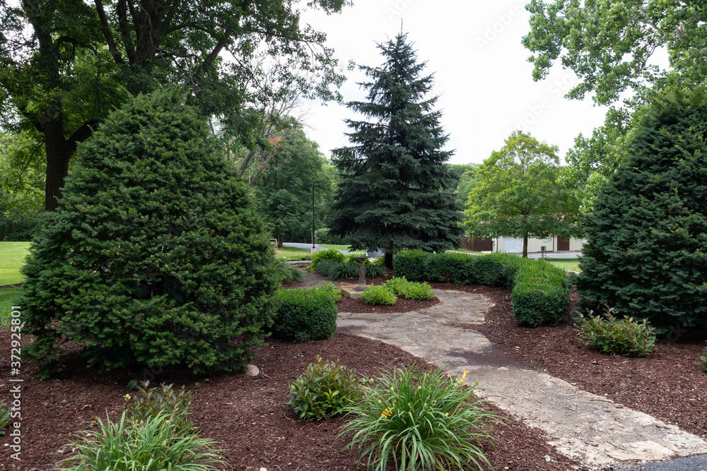 Beautiful Garden with Green Plants at Dellwood Park in Lockport Illinois during the Summer
