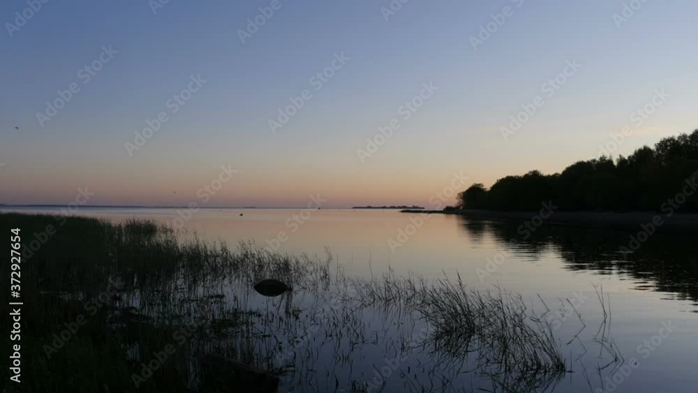 sunset on the lake beautiful evening landscape sunset on the lake beautiful evening landscape