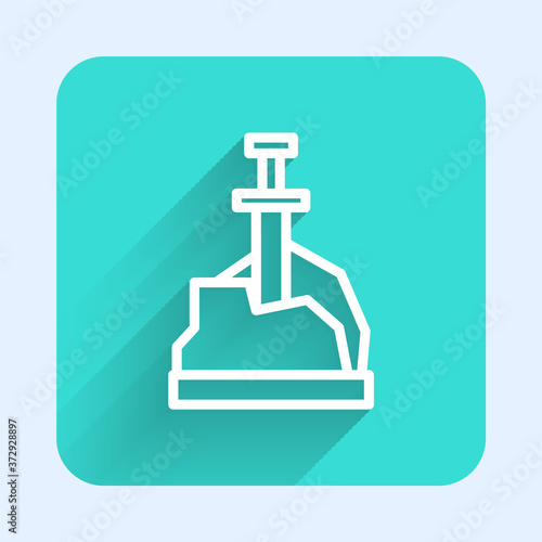 White line Sword in the stone icon isolated with long shadow. Excalibur the sword in the stone from the Arthurian legends. Green square button. Vector.