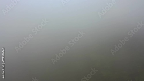 Flying through dense fog at Glengad mountain at Malin in County Donegal - Ireland photo