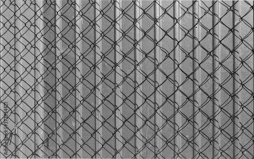 Fence made of iron sheet and chain-link mesh