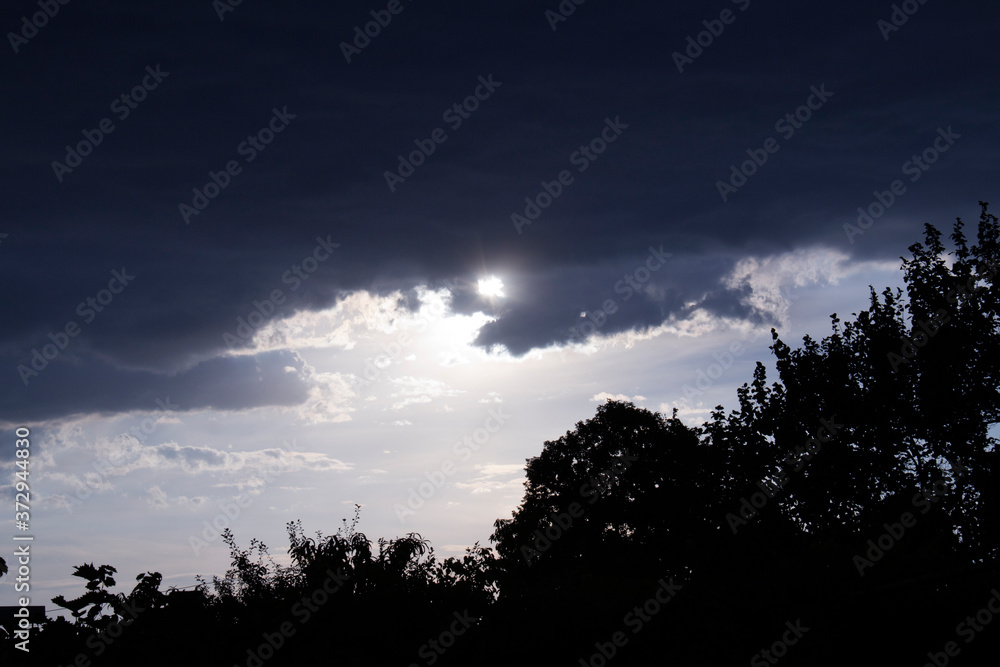 The sun runs away from thunderclouds. The sun runs away from thunderclouds.
