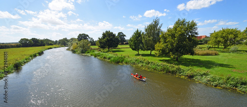 The River Ouse at  Great Barford Bedfordshire England with canoe 