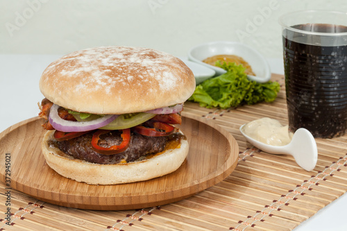 Tasty Argentine Burger With Meat And Chorizo.