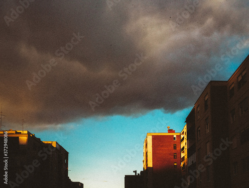 View of storm clouds over city