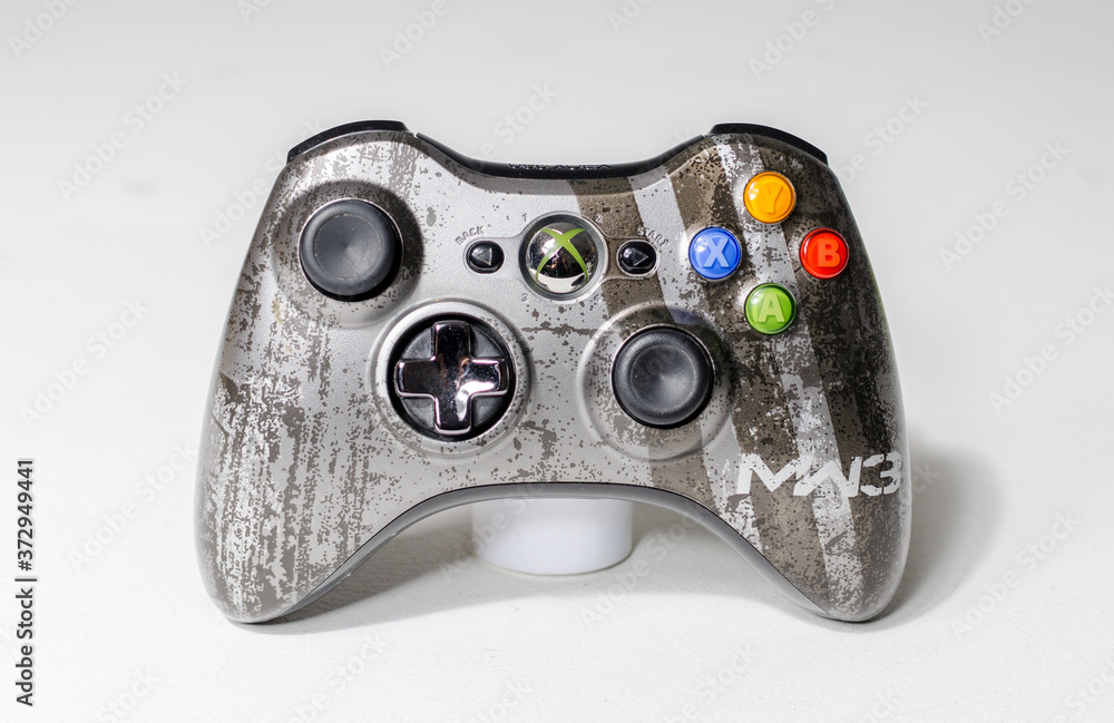 london, uk 05/05/2020 An microsoft xbox 360 call of duty modern warfare 3  limited edition controller on a white studio backdrop. collectable rare  home arcade video gaming. Stock Photo | Adobe Stock