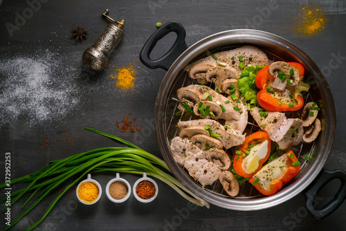 healthy food steamed chicken with mushrooms and vegetables 