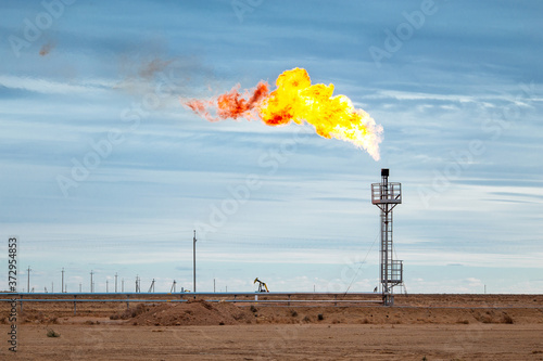 Fire on a stack of flare at oil and gas 
