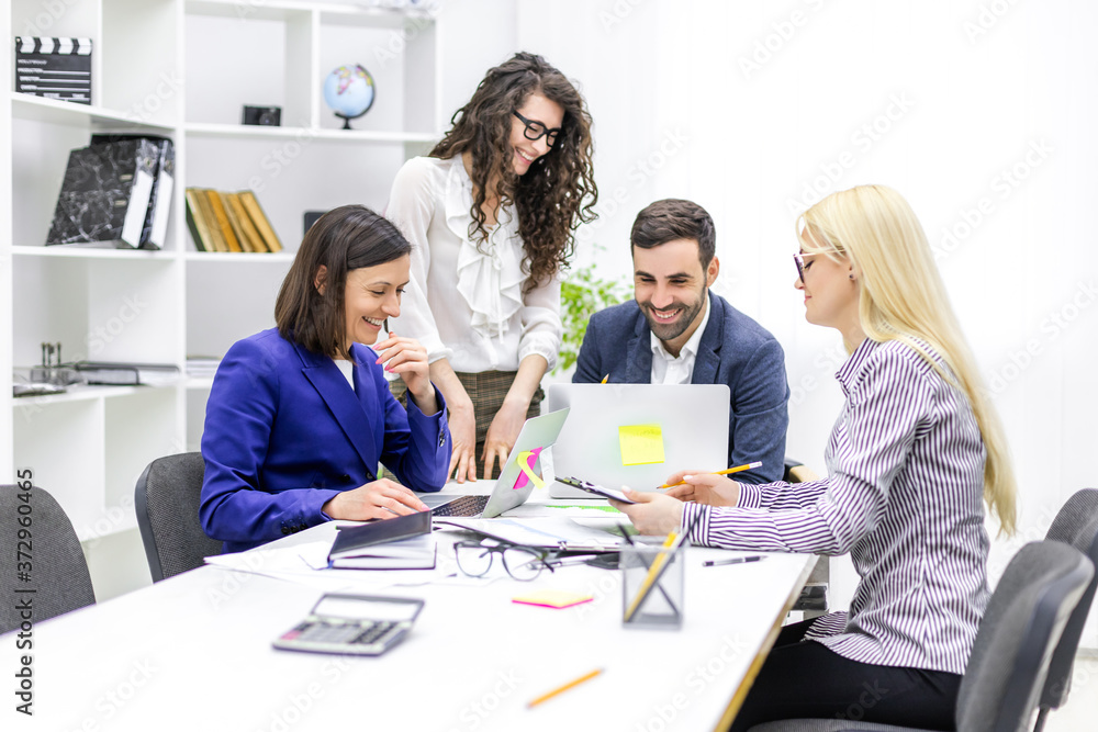 Fototapeta premium Photo of successful business team working on some project at the office.