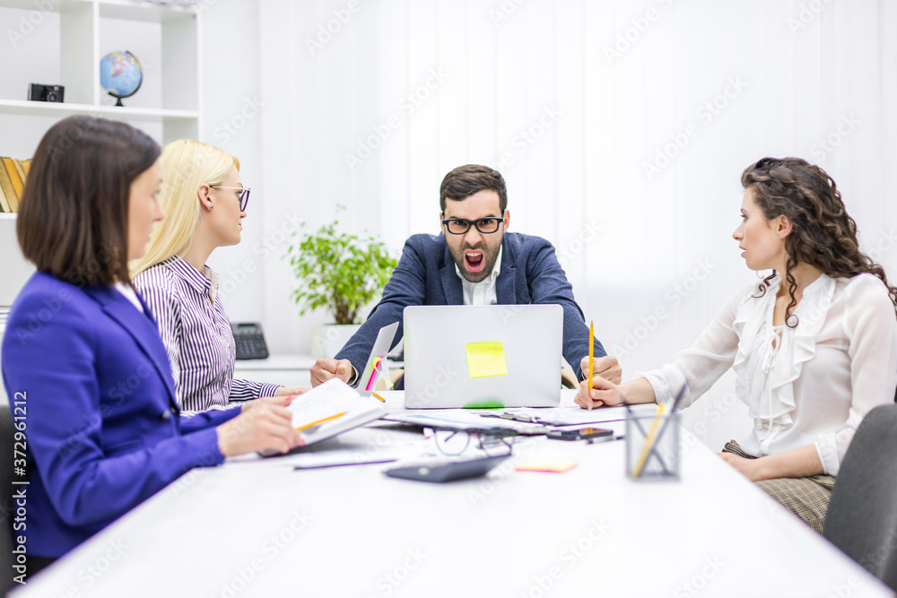 Photo of startup business team on meeting in modern bright office interior. Photo of startup business team on meeting in modern bright office interior.