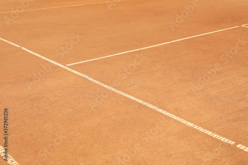 Clay tennis court background, space for text