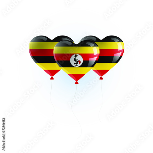 Heart shaped balloons with colors and flag of UGANDA vector illustration design. Isolated object.