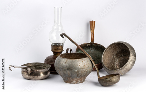 antique, rare, metal tableware. Objects of village life. Original utensils. culture of Russia. Objects on a white background.