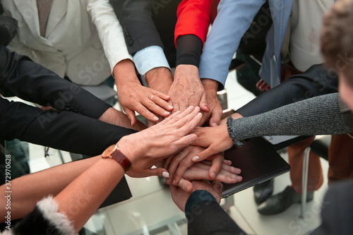 Wallpaper Mural Underneath view, Business teamwork groups people hands, stacked Torontodigital.ca