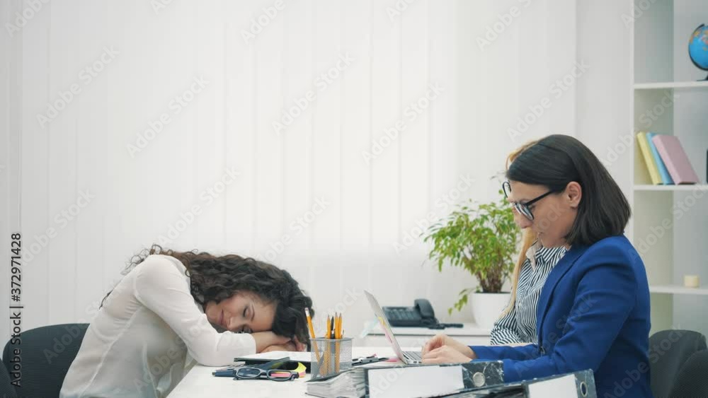 4k slowmotion video of office workers sitting at the table. 4k slowmotion video of office workers sitting at the table.