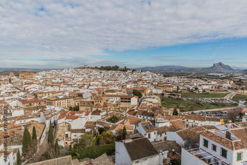 Panoramic view of the city of Antequera and the Peña de los Enamorados or The Lovers' Rock through, wonderful and cloudy day in the province of Malaga Spain