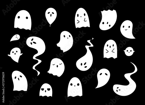 Black and white set of cute ghosts on black background. Drawn by hand doodle vector illustrations of ghosts for different halloween decorative designs.