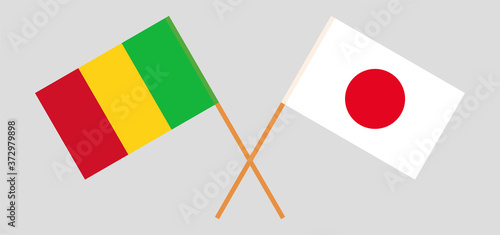 Crossed flags of Mali and Japan