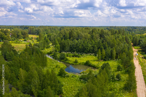 A small river Shakhmakhta near the village of Rogatino, Ivanovo region on a summer day.