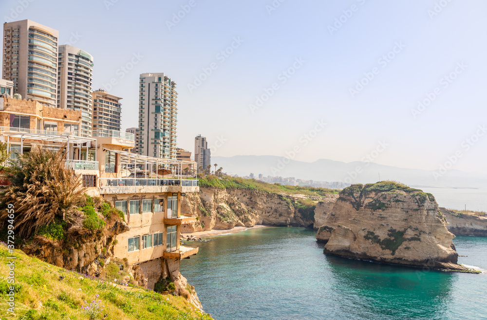 Raouche or pigeons rocks panorama with sea and ciry center in the background, Beirut, Lebanon