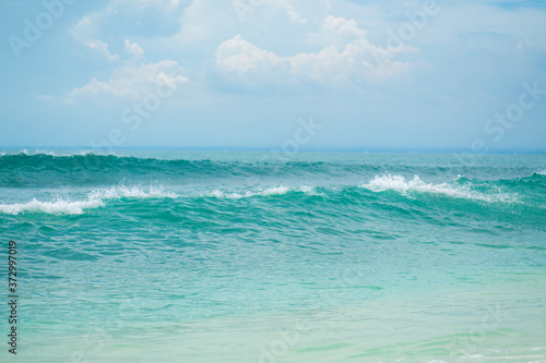 Photography An ideal tropical sandy beach for surfing on the ocean