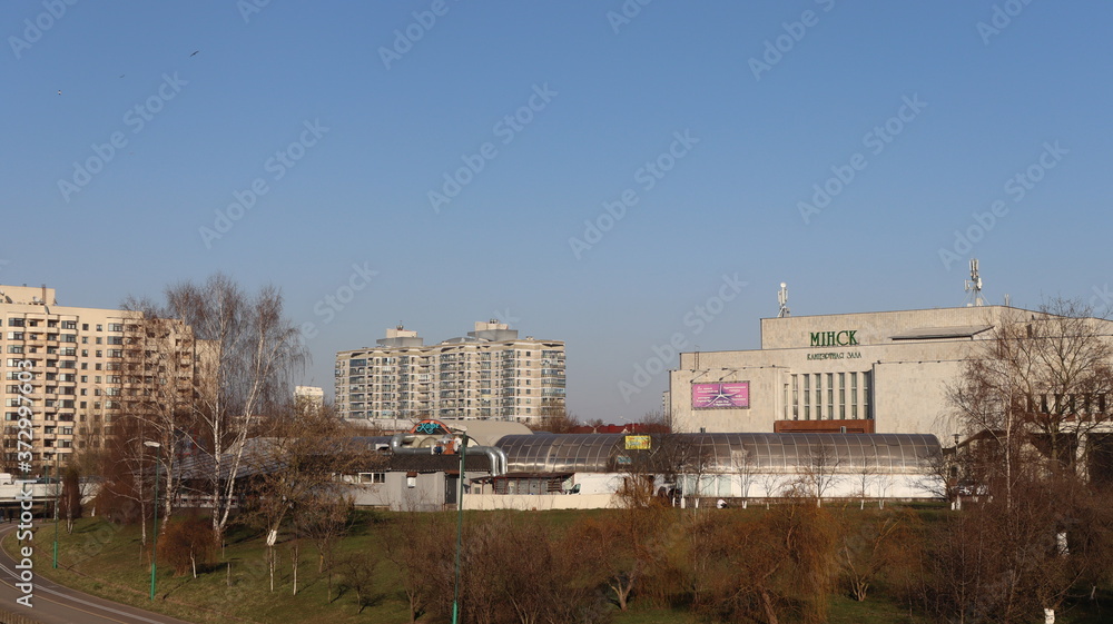 autumn MInsk central street with buildings and quayside autumn MInsk central street with buildings and quayside