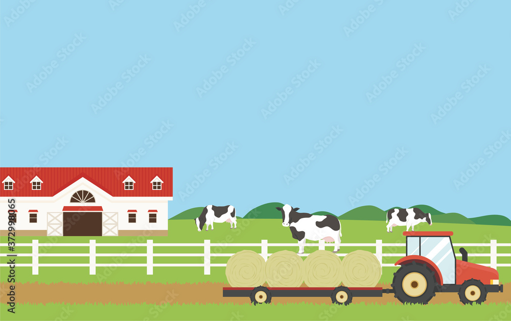 牧場と牛とトラクター