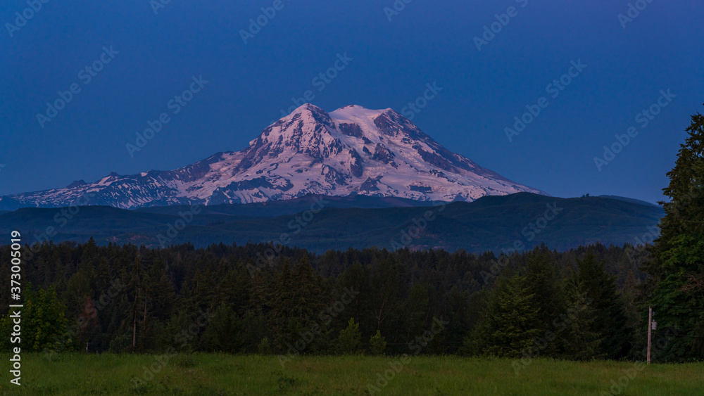 Mount Rainier During Last Light With Blue Skies