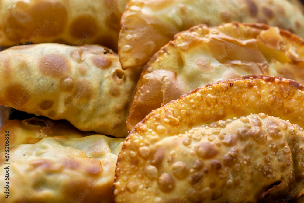 Traditional Brazilian food called pastel close-up Traditional Brazilian food called pastel close-up