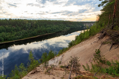 Palieozerskaya hydroelectric power plant and Suna river in Hirvas, Karelia region, Russia). Hydroelectric dam, reservoir, powerhouse, waterway, spillway gates. Girvas beautiful scandinavian landscape photo