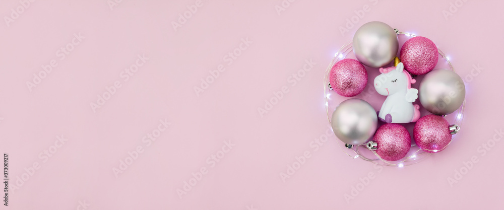Christmas tree toys and balls surrounded by light garland. New year banner. Copy space Christmas tree toys and balls surrounded by light garland. New year banner. Copy space