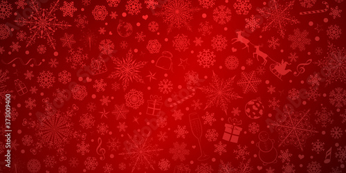 Christmas background of various snowflakes and holiday symbols, in red colors