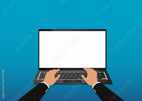 Hand typing on laptop