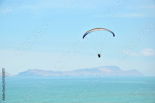 paraglider over the sea in Lima