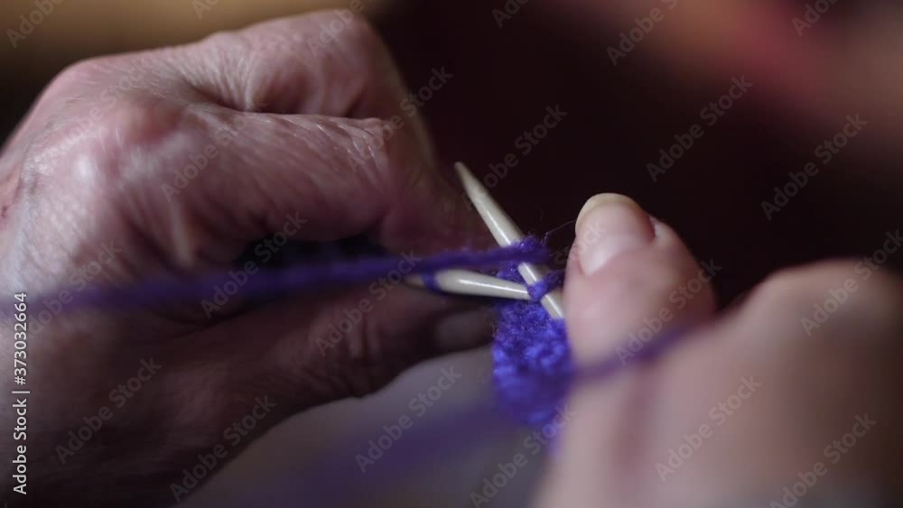 ederly woman hands Knitting doing crochet ederly woman hands Knitting doing crochet