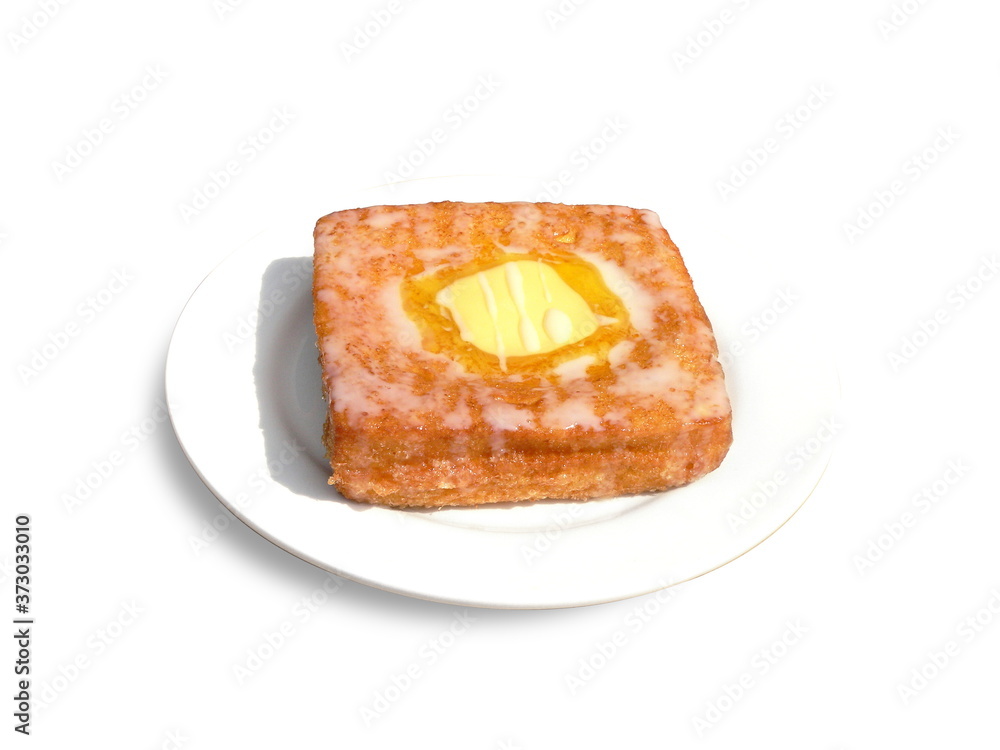 Close up of a typical Cantonese and Hong Kong bread Hong Kong style French Toast with butter (Chinese: Xiduoshi) Close up of a typical Cantonese and Hong Kong bread Hong Kong style French Toast with butter (Chinese: Xiduoshi)