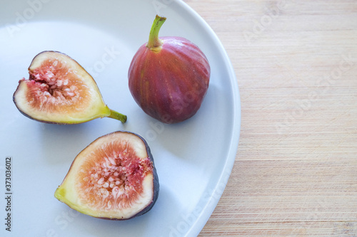 Common figs, Ficus carica , on a plate
