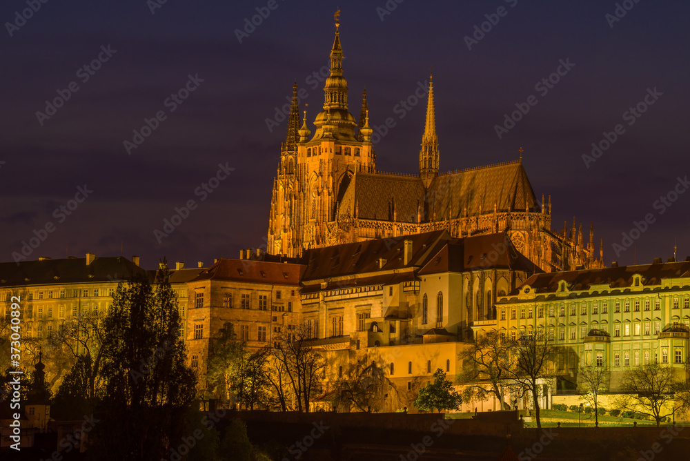 View of St. Vitus Cathedral in night illumination on April evening. Prague, Czech Republic