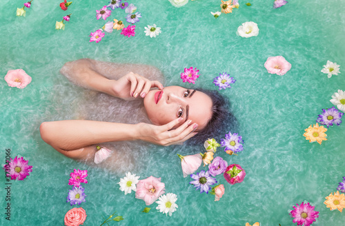 Young beautiful woman relaxes spa procerure