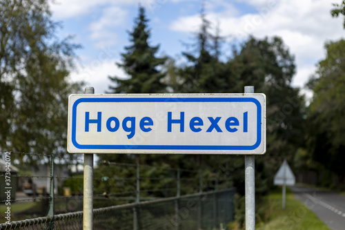 HOGE HEXEL, NETHERLANDS - Jul 30, 2020: City limit sign with name of the village photo