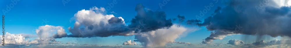 Fantastic clouds against blue sky, panorama Fantastic clouds against blue sky, panorama
