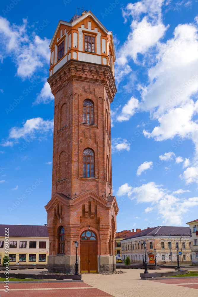 Old water tower on Cathedral Square close-up on a sunny July morning. Staraya Russa, Russia