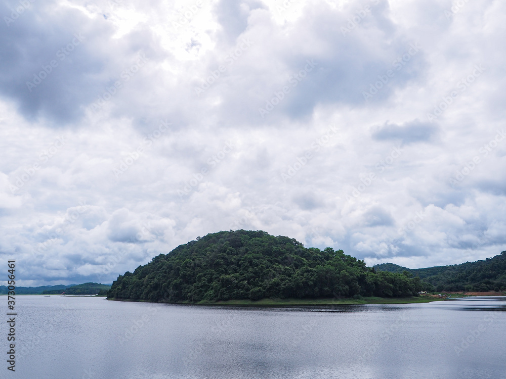 The mountains are paired with reservoirs and have thick clouds and reflections of the water in Rayong, Thailand.  (Khao Chuk Reservoir National Park)