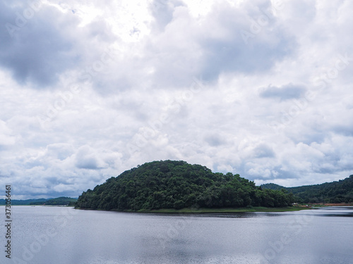 The mountains are paired with reservoirs and have thick clouds and reflections of the water in Rayong, Thailand. (Khao Chuk Reservoir National Park)