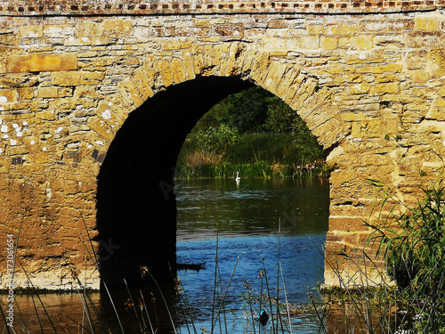 Medieval bridge over river Avon. Pershore Worcestershire England UK photo