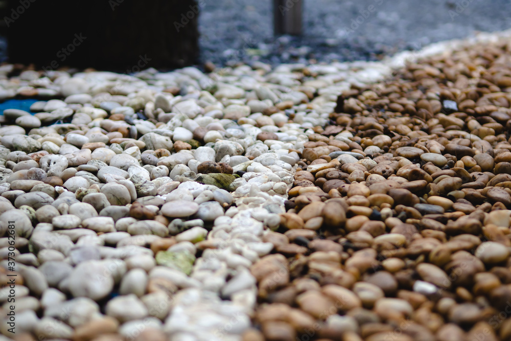 Obraz premium Blur two tone pebbles for background or text.