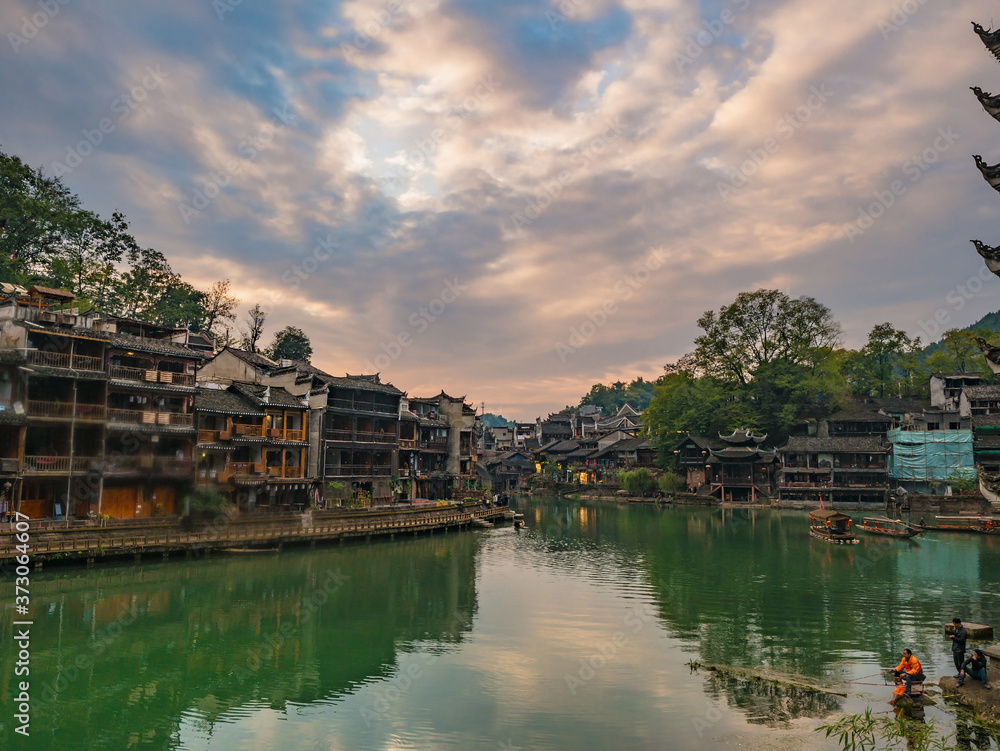 fenghuang,Hunan/China-16 October 2018:Unacquainted poeple with Scenery view of fenghuang old town .phoenix ancient town or Fenghuang County is a county of Hunan Province, China