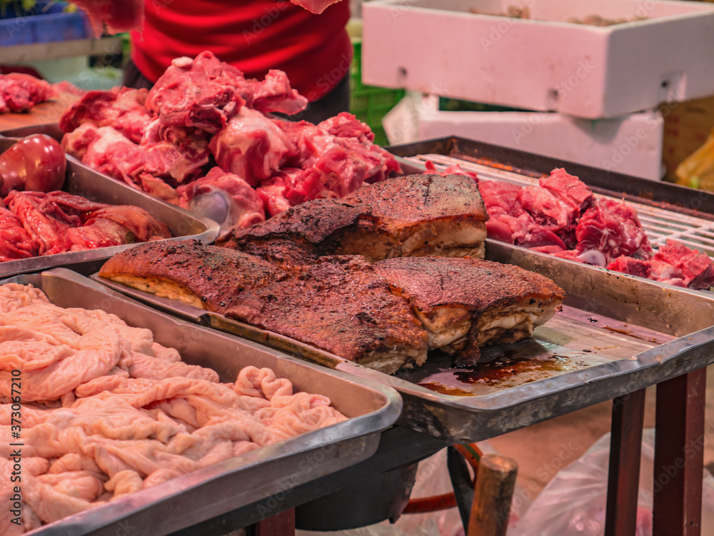 Fried Pork belly and raw pork in the chinese Fresh market at changsha city china